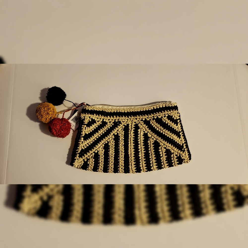 Olivia Miller black and cream, rattan clutch.